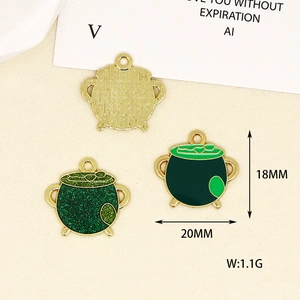 Macro view of green St. Patrick's Day cauldron charms with size and weight specifications.