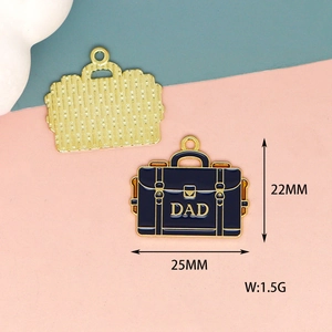 Detail view of navy blue enamel briefcase pendant with DAD lettering and dimensions