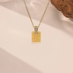 Gold plated square pendant necklace with destiny engraving and crystal accents