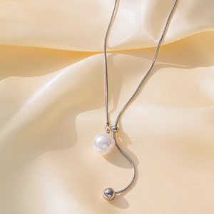 Minimalist silver adjustable sweater chain necklace with large pearl and metal ball pendant