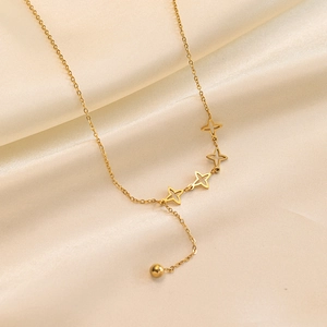 Elegant 18k gold-plated Y-necklace with hollow star pendants and bead on silk