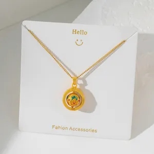Golden stainless steel rotating pendant necklace with painted face bead and 45cm chain