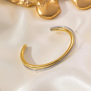 Minimalist double layer open bangle in polished 18K gold and silver stainless steel
