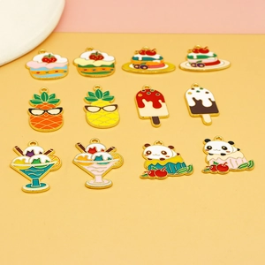 Assorted colorful summer dessert and panda enamel charms for DIY jewelry making.