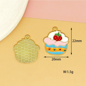 Macro detail of colorful cupcake enamel pendant showing 22mm dimensions and 1.5g weight