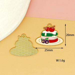Detail view of colorful enamel cake charms with 20mm height and 25mm width markers