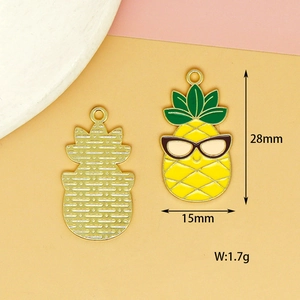 Detailed view of yellow enamel pineapple charm with dimensions 28mm and weight 1.7g