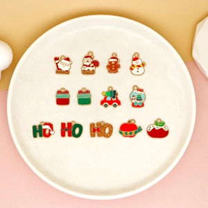 Macro detail of various Christmas alloy enamel charms for DIY necklace and bracelet