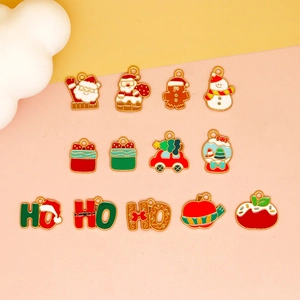 Detailed macro view of assorted colorful Christmas enamel charms for DIY jewelry making