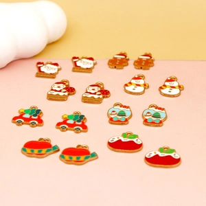 Close-up of colorful Christmas-themed enamel alloy pendants for DIY jewelry making.