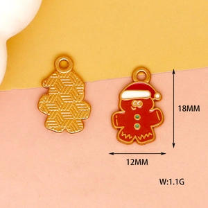 Detailed macro view of Christmas gingerbread man alloy charms with 18mm size markings