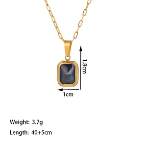 Vintage 18K gold plated necklace featuring a rectangular dark blue gemstone pendant