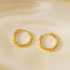 Classic golden hoop earrings with hammered texture and secure clasp for women
