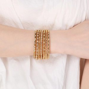 Eleganti bracciali in acciaio inossidabile placcati oro 18K con zirconi bianchi da donna