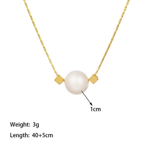 Minimalist gold chain necklace with a 1cm white pearl pendant and metal cubes