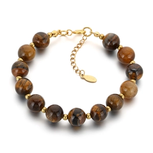 Trendy adjustable tiger eye stone bead bracelet with gold stainless steel spacers.