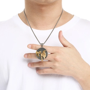 Detail view of Viking battle axe and raven totem pendant on stainless steel chain