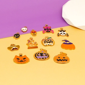 Detailed view of assorted Halloween alloy enamel charms with pumpkin and skull DIY designs