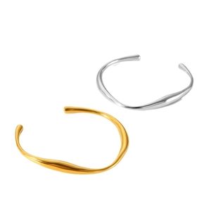 Set of gold and silver irregular fluid open bangles with polished liquid metal finish