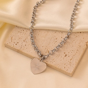Silver stainless steel thick chain necklace with radial textured heart pendant on stone