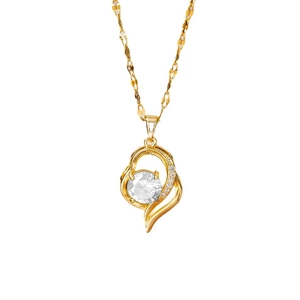 Minimalist 18k gold necklace with heart and flame pendant featuring a large white zircon