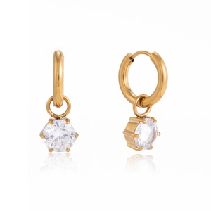 Detail view of gold stainless steel hoop earrings with clear cubic zirconia pendants.