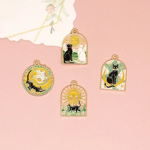 Set of mystical enamel cat charms featuring sun and moon designs for DIY jewelry.