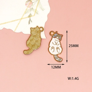 Detailed view of cat enamel charms with 25mm length and 1.4g weight measurements