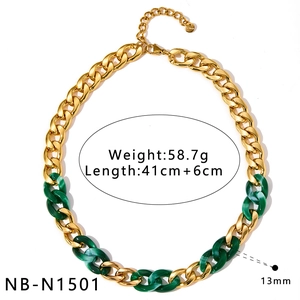 Detailed macro view of a chunky gold and green acrylic link necklace with specifications