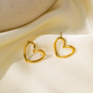 Minimalist hollow heart gold stud earrings for women with a sleek open-line design