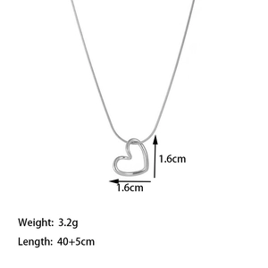 Detail view of hollow heart pendant measuring 1.6cm with 40cm snake chain necklace