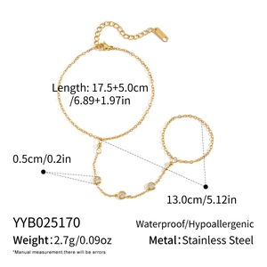 Stainless steel 18K gold hand chain ring with zircon details, waterproof and hypoallergenic.