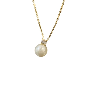 Elegant gold titanium steel necklace featuring a single baroque pearl and crystal pendant