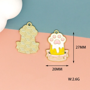 Detail view of cat paw enamel charm with 27mm height and 20mm width dimensions.