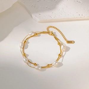 Double-layer gold stainless steel bracelet with seven freshwater pearls and lobster clasp