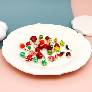 Close-up of colorful fruit and vegetable alloy enamel charms for DIY jewelry making
