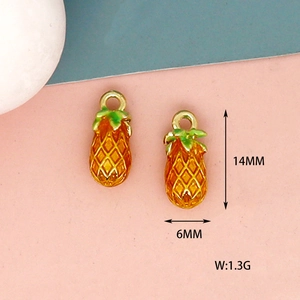 Close-up of mini pineapple enamel charms with 14mm height and 6mm width measurements.