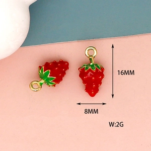Detail showing dimensions (16mm x 8mm) of red strawberry alloy charms, weighing 2g.