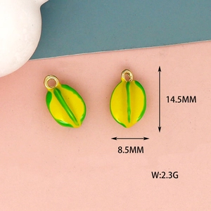 Detail of yellow carambola enamel charms showing dimensions 14.5mm by 8.5mm and weight 2.3g