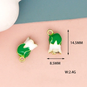 Detailed view of green and white flower bud alloy charm with measurements