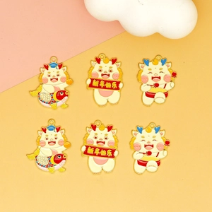 Detailed macro view of cute cartoon Chinese zodiac dragon charms for DIY jewelry crafts.