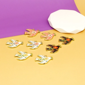 Close-up view of enamel bird jewelry charms with floral patterns for DIY jewelry making