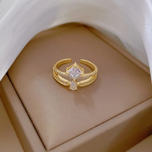 Adjustable 18k gold plated crown ring with square and pear-shaped sparkling crystals