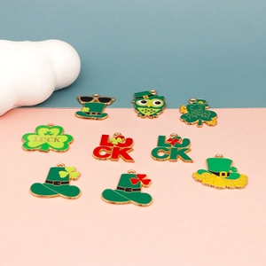 Detailed macro view of assorted St. Patrick's Day alloy enamel charms with lucky shamrock
