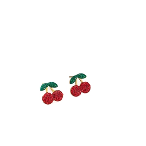 Sweet titanium steel cherry earrings with red and green rhinestones on white background