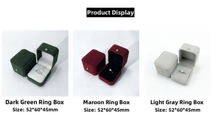 Three colors of velvet ring boxes with gold buckles showing open and closed views