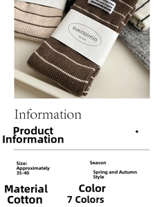 Close-up of cotton crew socks featuring earthy striped patterns and ruffle trim details