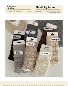 Detail of cable knit leg warmers showing texture softness and multiple neutral color options