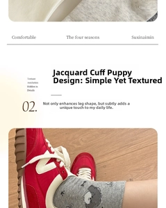 Detail of grey cotton mid-tube socks featuring a cute curly dog pattern with red sneakers