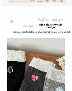 Detail showing elastic ribbed cuffs and festive embroidery on thick wool knit socks